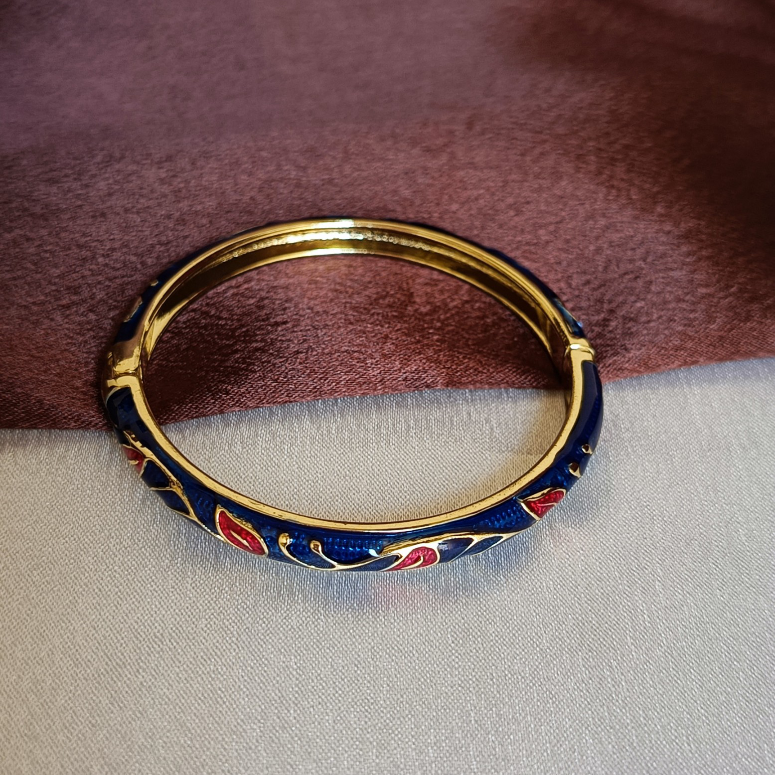 JJ Gold-Plated Blue & Red Enamel Bangle Artistic Statement Design