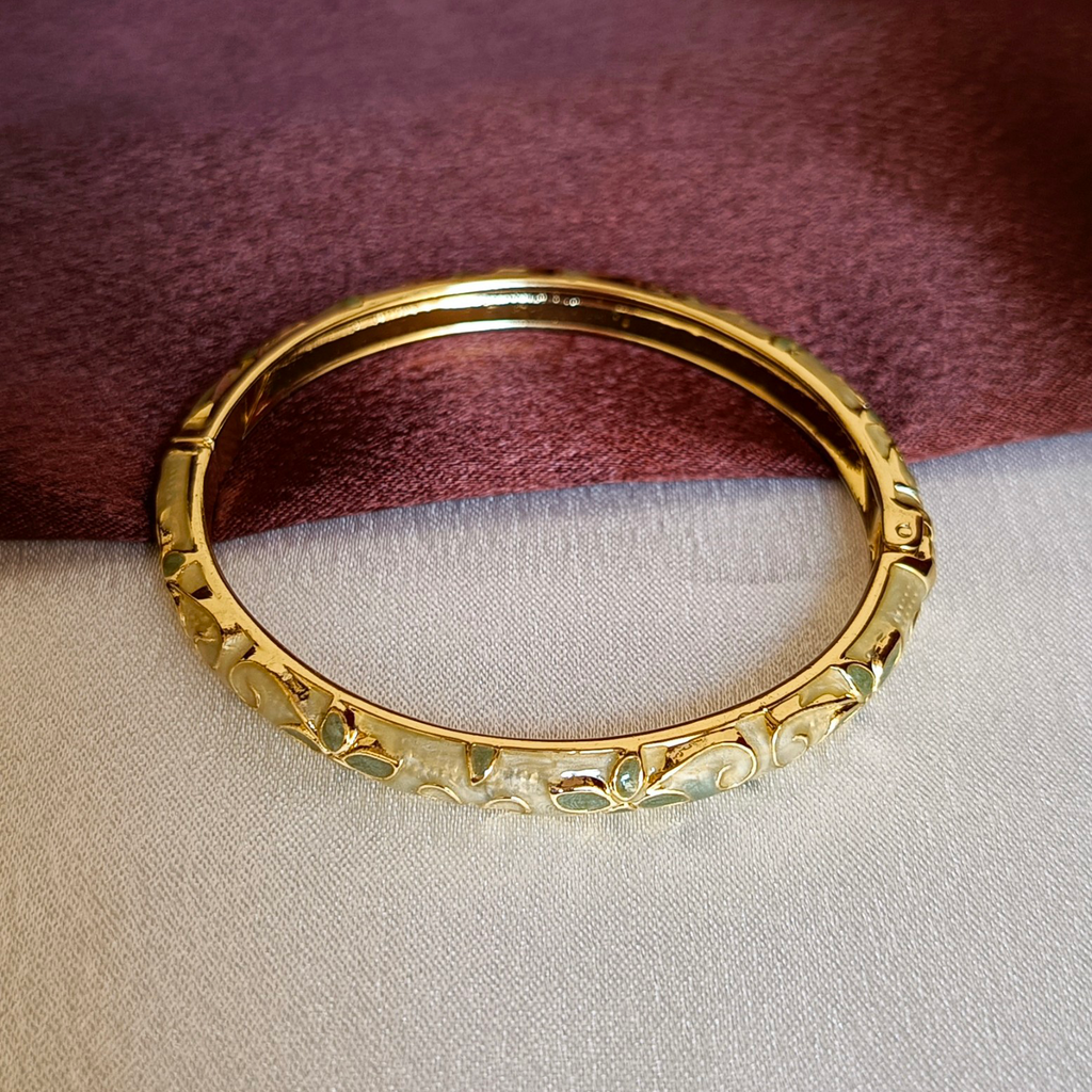 JJ Gold-Plated Ivory Enamel Bangle Leaf Motif Design