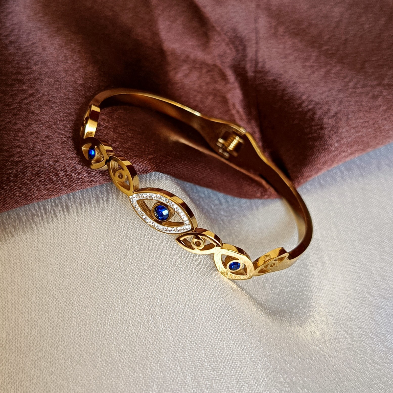 JJ Gold-Plated Evil Eye Cuff Sapphire Accent Design