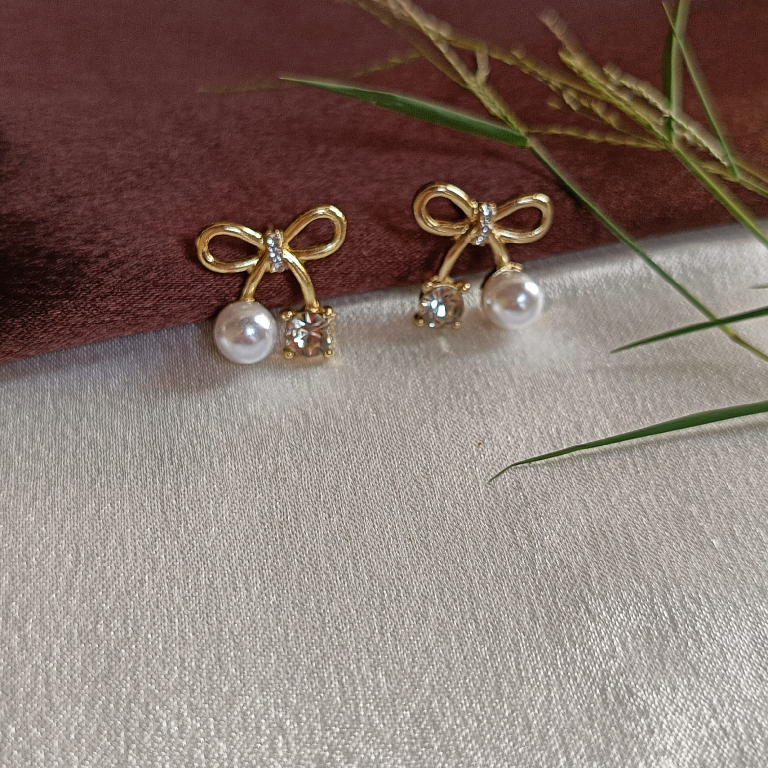 JJ Gold & Pearl Stud Earrings – Bow Tie Drop Design