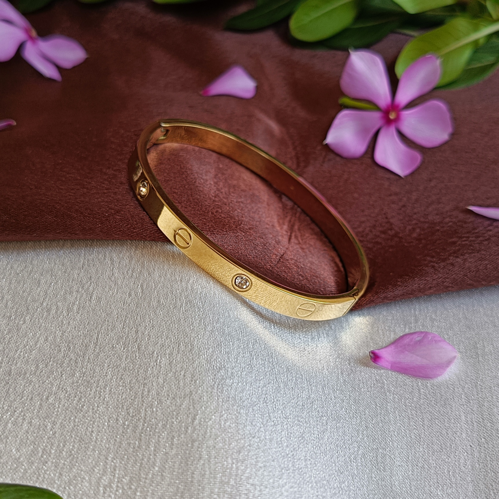 JJ Gold-Plated Screw Motif Bangle Crystal Accent Design