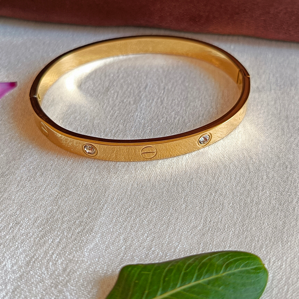 JJ Gold-Plated Screw Motif Bangle Crystal Accent Design